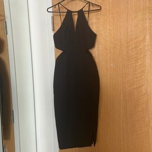 Beautifully fitted black cut out dress!